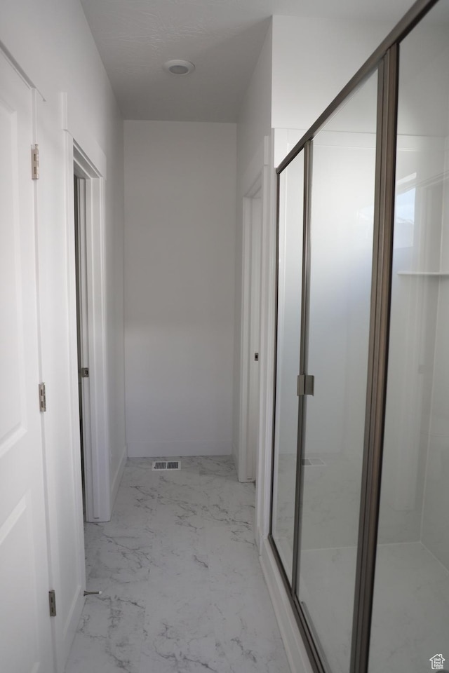 1905 E 1420 N, Spanish Fork, UT 84660 - hallway featuring light marble finish flooring and baseboards