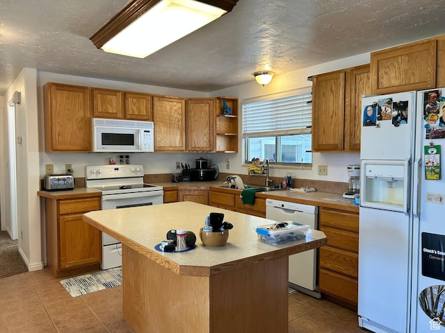 545 E Molen Rd, Ferron, UT 84523 - kitchen with white appliances, light tile patterned floors, a sink, open shelves, and light countertops