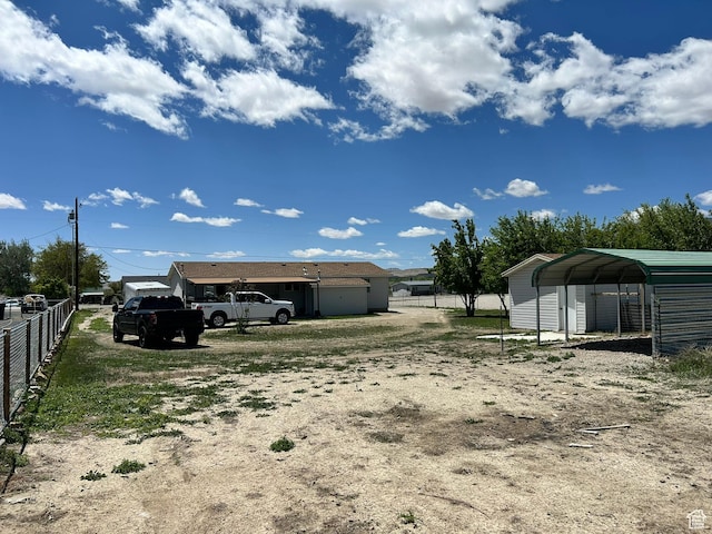 545 E Molen Rd, Ferron, UT 84523 - view of yard featuring a carport