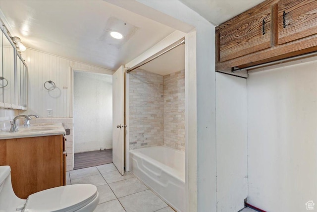 660 S Coleman St, Tooele, UT 84074 - bathroom with toilet, vanity, tile patterned flooring, and shower / bathtub combination