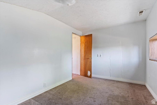 660 S Coleman St, Tooele, UT 84074 - unfurnished room with carpet, baseboards, and a textured ceiling
