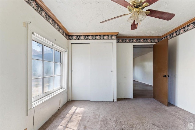 660 S Coleman St, Tooele, UT 84074 - unfurnished bedroom with carpet floors, crown molding, a closet, and ceiling fan