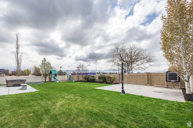 2949 W Hayden Ridge Way, Riverton, UT 84065 - view of yard featuring a hot tub, a playground, and a patio