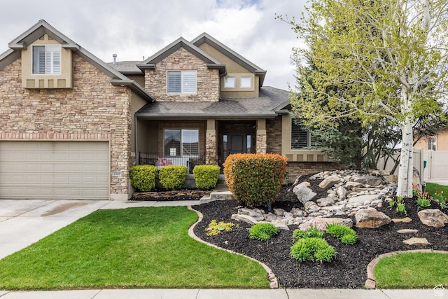 2949 W Hayden Ridge Way, Riverton, UT 84065 - craftsman-style home with stone siding, driveway, an attached garage, a porch, and roof with shingles