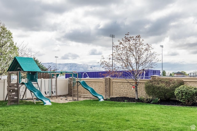2949 W Hayden Ridge Way, Riverton, UT 84065 - view of play area featuring a mountain view