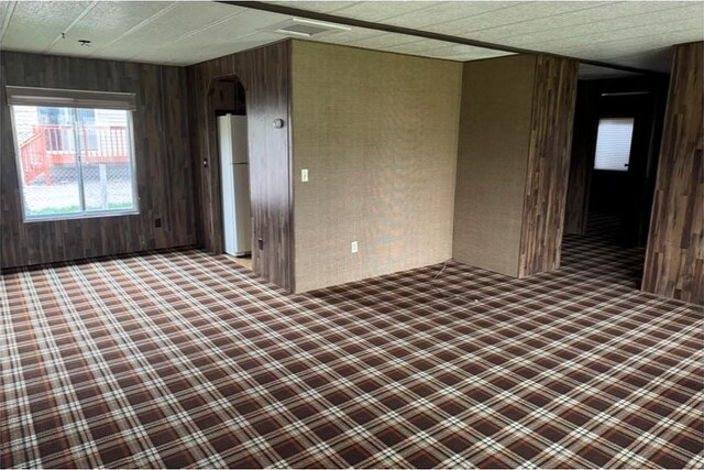 184 N 3rd E, Manila, UT 84046 - spare room featuring wooden walls