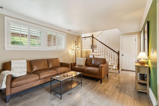 518 E 3955 S, Millcreek, UT 84107 - living area with stairway, light wood-style floors, and ornamental molding