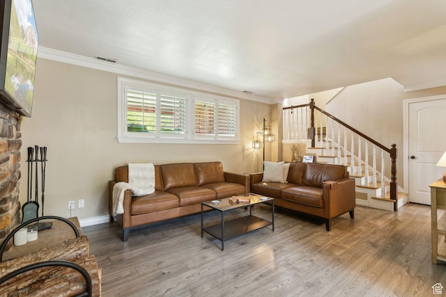 518 E 3955 S, Millcreek, UT 84107 - living room featuring stairway, wood finished floors, baseboards, and ornamental molding