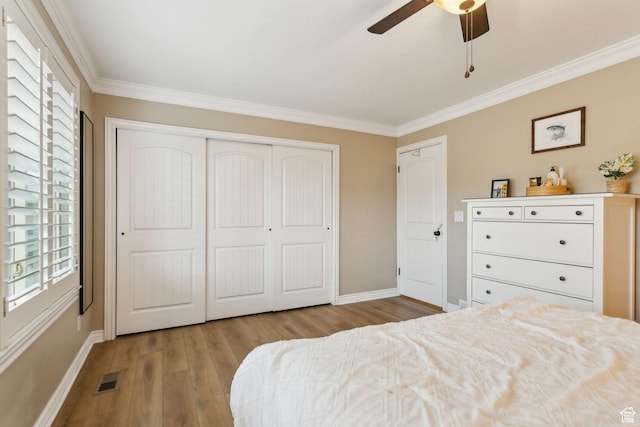 518 E 3955 S, Millcreek, UT 84107 - bedroom featuring crown molding, baseboards, wood finished floors, and multiple windows