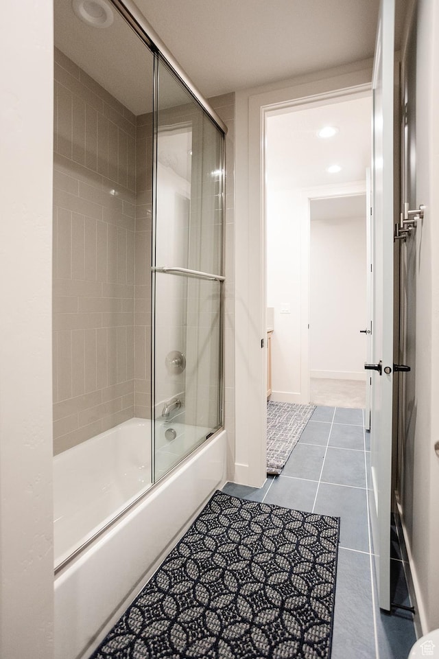 778 N 780th St W, American Fork, UT 84003 - bathroom featuring tile patterned floors, bath / shower combo with glass door, and baseboards