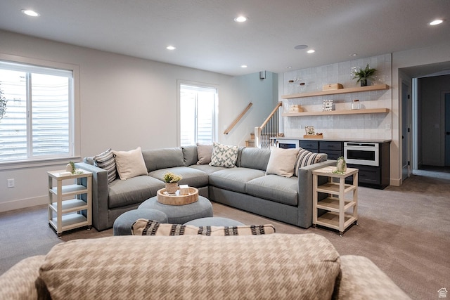 778 N 780th St W, American Fork, UT 84003 - living area with recessed lighting, healthy amount of natural light, stairway, baseboards, and light colored carpet