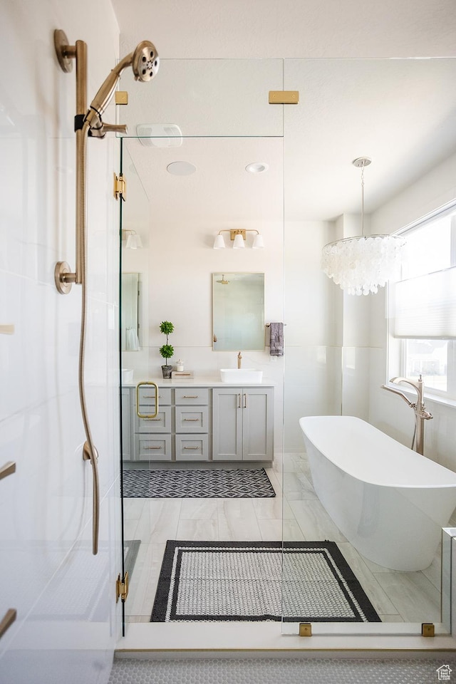 778 N 780th St W, American Fork, UT 84003 - full bath with vanity, a stall shower, a soaking tub, and marble finish flooring