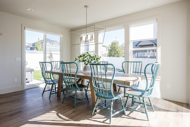 778 N 780th St W, American Fork, UT 84003 - dining space with wood finished floors, a chandelier, and baseboards