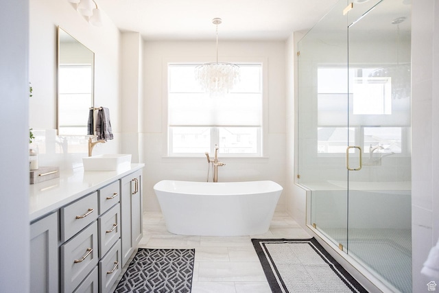 778 N 780th St W, American Fork, UT 84003 - bathroom featuring vanity, a freestanding bath, a shower stall, and a chandelier