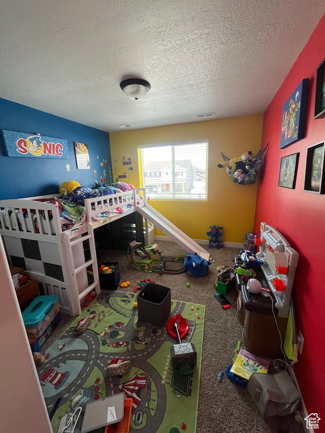2323 W Thomas Ct, Syracuse, UT 84075 - bedroom with a textured ceiling and carpet floors