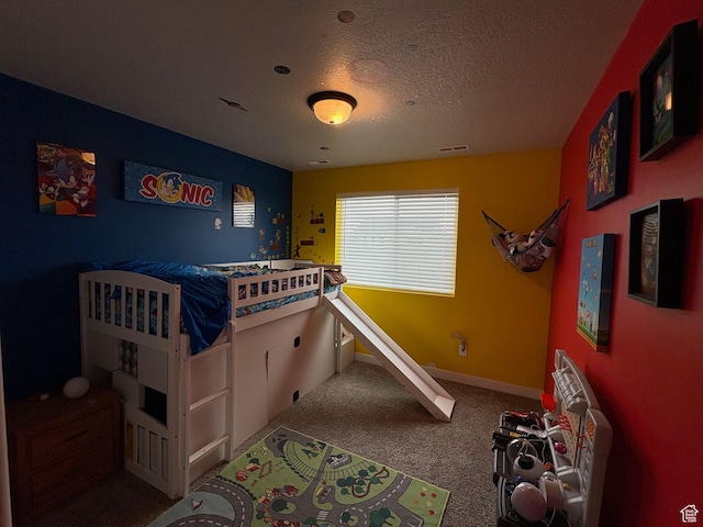 2323 W Thomas Ct, Syracuse, UT 84075 - carpeted bedroom featuring a textured ceiling and baseboards
