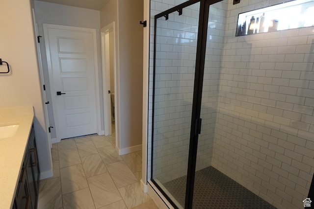 2323 W Thomas Ct, Syracuse, UT 84075 - full bathroom featuring a stall shower, vanity, baseboards, and marble finish floors