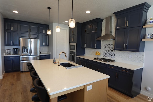 2323 W Thomas Ct, Syracuse, UT 84075 - kitchen featuring stainless steel appliances, wall chimney range hood, a sink, open shelves, and a breakfast bar area