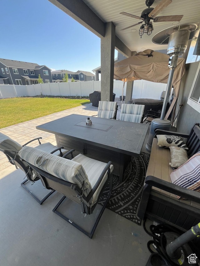 2323 W Thomas Ct, Syracuse, UT 84075 - view of patio with a hot tub, a ceiling fan, a residential view, and an outdoor hangout area
