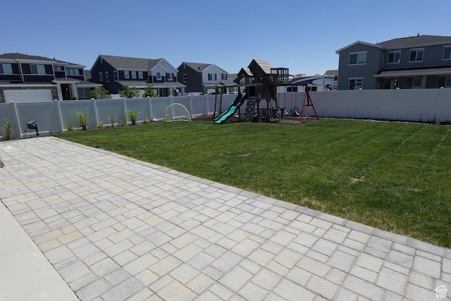2323 W Thomas Ct, Syracuse, UT 84075 - view of yard featuring a residential view, a playground, and a patio