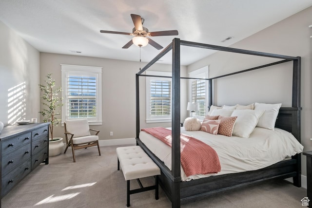4492 W Enid Dr, South Jordan, UT 84009 - bedroom with light colored carpet, baseboards, and a ceiling fan