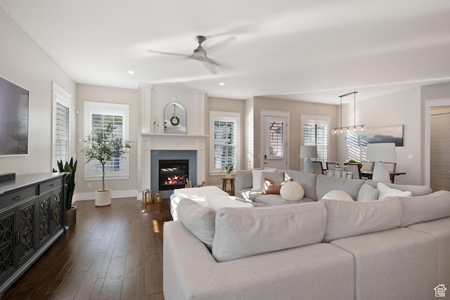 4492 W Enid Dr, South Jordan, UT 84009 - living area featuring ceiling fan, dark wood-style floors, plenty of natural light, a fireplace, and recessed lighting