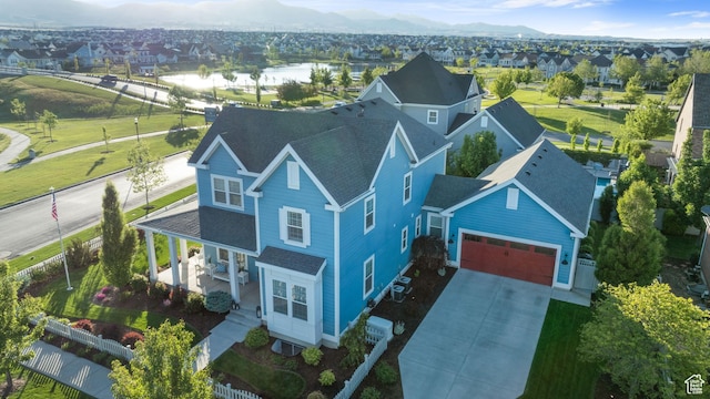 4492 W Enid Dr, South Jordan, UT 84009 - aerial perspective of suburban area with a mountain backdrop