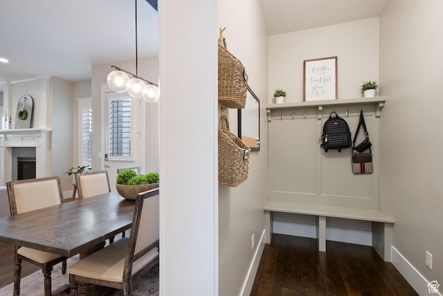 4492 W Enid Dr, South Jordan, UT 84009 - mudroom with baseboards, hardwood / wood-style floors, and a fireplace