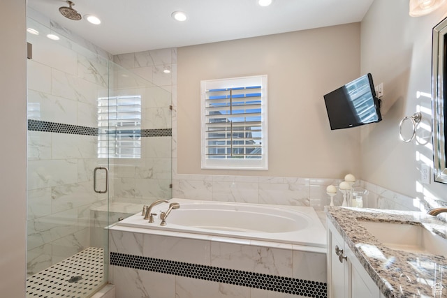 4492 W Enid Dr, South Jordan, UT 84009 - full bath featuring a garden tub, a stall shower, vanity, and recessed lighting