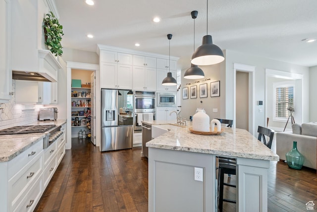 4492 W Enid Dr, South Jordan, UT 84009 - kitchen featuring appliances with stainless steel finishes, beverage cooler, backsplash, a sink, and white cabinets