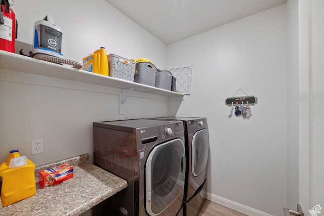478 S Albano Way, St George, UT 84770 - washroom with separate washer and dryer, baseboards, and light wood finished floors