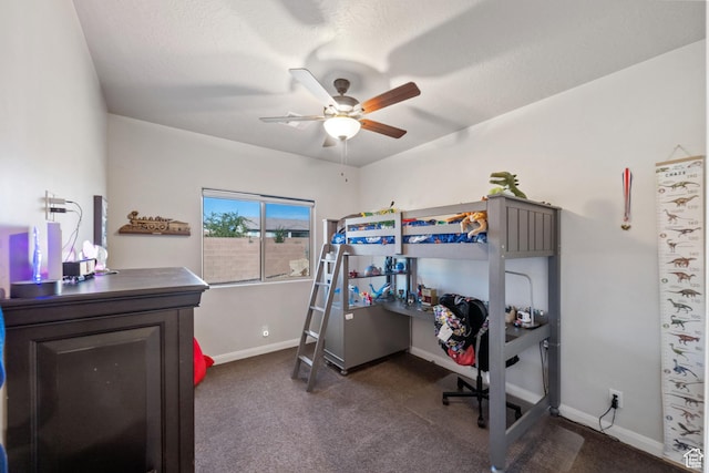 478 S Albano Way, St George, UT 84770 - bedroom with dark carpet, baseboards, and a ceiling fan