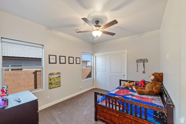478 S Albano Way, St George, UT 84770 - bedroom with carpet flooring, baseboards, a ceiling fan, and a closet