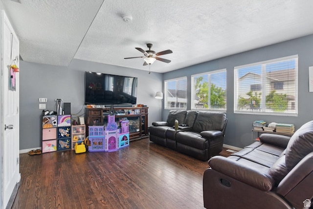 122 W Stern Ct Unit 25, Stansbury Park, UT 84074 - living room with wood finished floors, ceiling fan, baseboards, and a textured ceiling