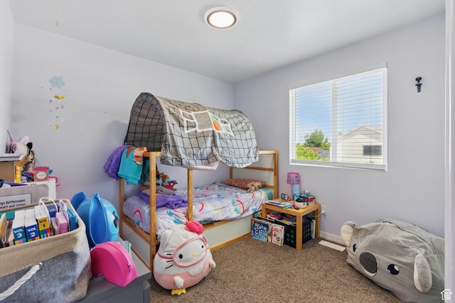 122 W Stern Ct Unit 25, Stansbury Park, UT 84074 - bedroom featuring carpet floors and baseboards