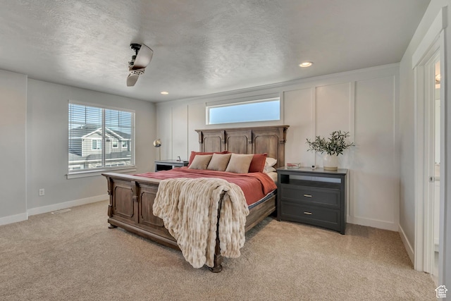 10966 S Coastal Dune Dr, South Jordan, UT 84009 - bedroom featuring light carpet, baseboards, a ceiling fan, recessed lighting, and a textured ceiling