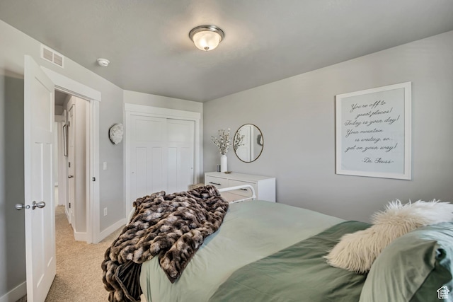 10966 S Coastal Dune Dr, South Jordan, UT 84009 - bedroom with light carpet, a closet, and baseboards
