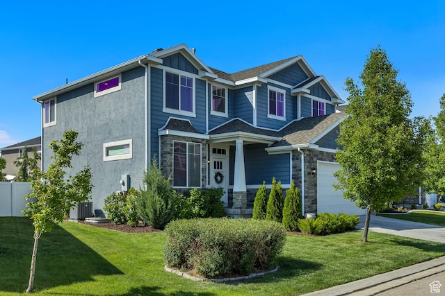 10966 S Coastal Dune Dr, South Jordan, UT 84009 - view of front of home with stone siding and concrete driveway