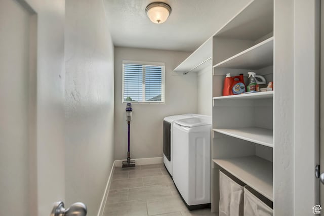 10966 S Coastal Dune Dr, South Jordan, UT 84009 - laundry area featuring independent washer and dryer, baseboards, and light tile patterned flooring