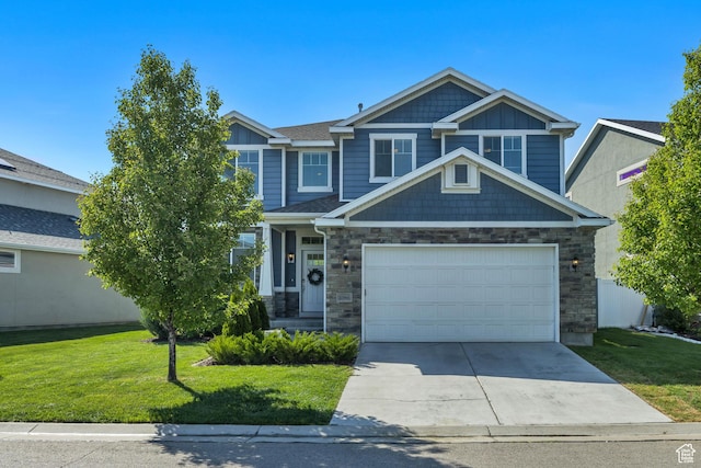 10966 S Coastal Dune Dr, South Jordan, UT 84009 - craftsman house with stone siding, concrete driveway, a front lawn, and a garage