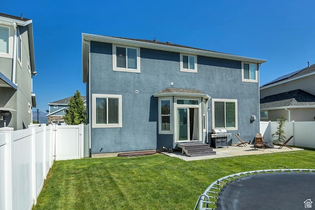 10966 S Coastal Dune Dr, South Jordan, UT 84009 - rear view of house featuring stucco siding and a patio
