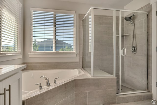 10966 S Coastal Dune Dr, South Jordan, UT 84009 - full bath featuring a garden tub, vanity, and a shower stall