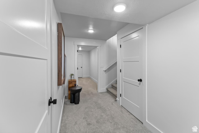 2041 W Pinnacle Ave, Mapleton, UT 84664 - corridor with light carpet, stairway, and baseboards