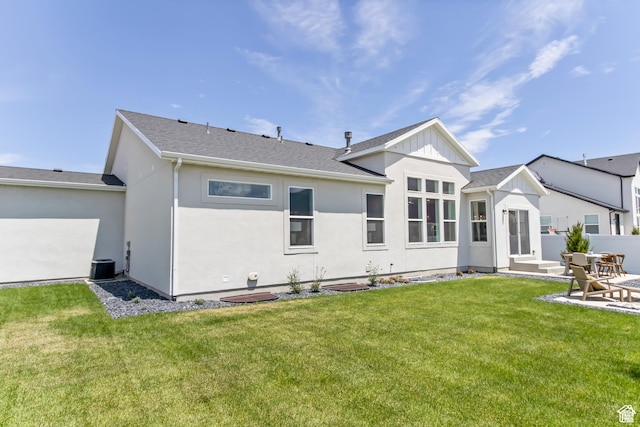 2041 W Pinnacle Ave, Mapleton, UT 84664 - rear view of house featuring a lawn, a patio, stucco siding, and cooling unit