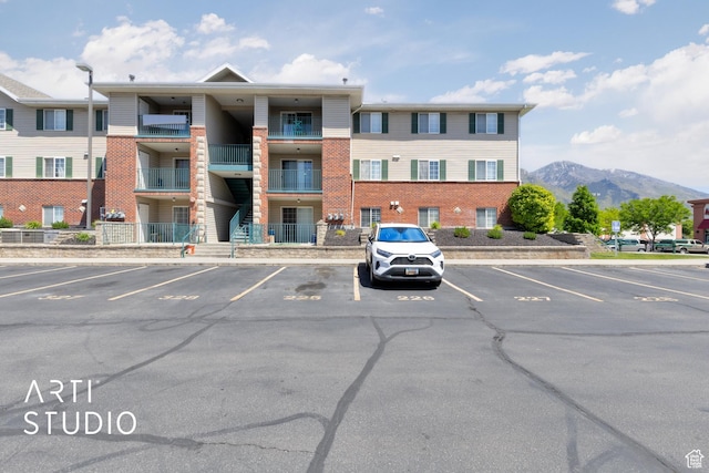 98 W 1230 N Unit 226, Provo, UT 84604 - view of building exterior with uncovered parking and a mountain view