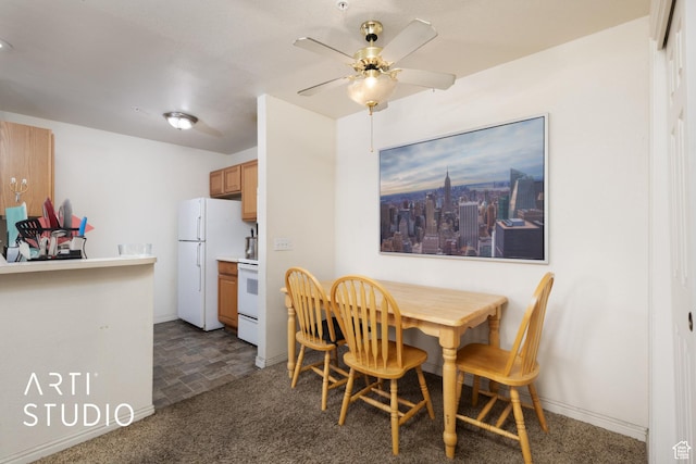 98 W 1230 N Unit 226, Provo, UT 84604 - dining room with ceiling fan, baseboards, and dark colored carpet
