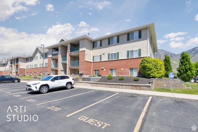 98 W 1230 N Unit 226, Provo, UT 84604 - view of building exterior featuring uncovered parking and a mountain view