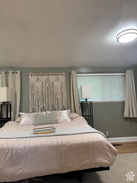 495 E 34 S Unit 10, Orem, UT 84097 - bedroom with baseboards and wood finished floors
