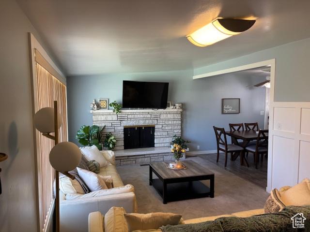 495 E 34 S Unit 10, Orem, UT 84097 - carpeted living room featuring a stone fireplace