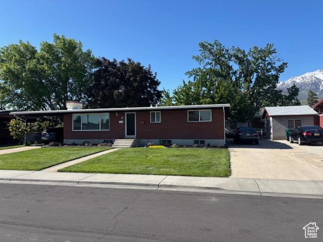 495 E 34 S Unit 10, Orem, UT 84097 - ranch-style house with driveway, entry steps, a front yard, and a mountain view